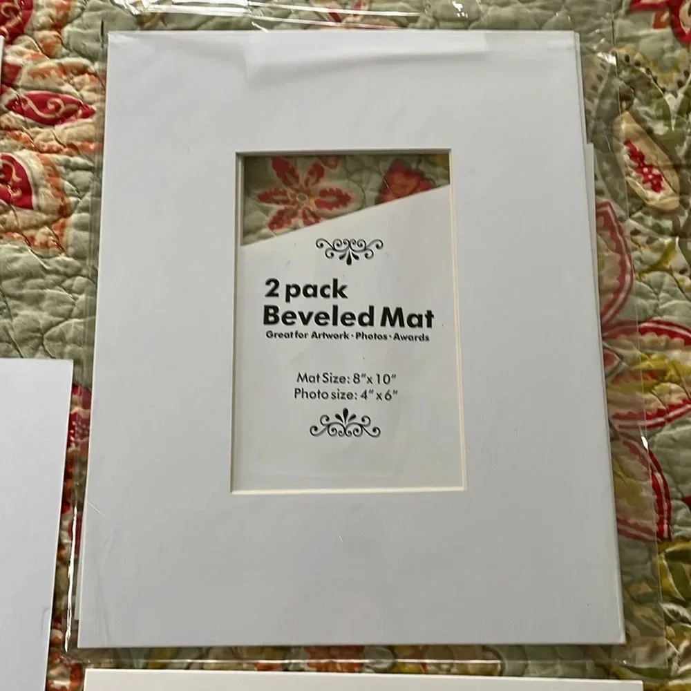 5 new/unused white picture frame mats. Sizes shown in pics.